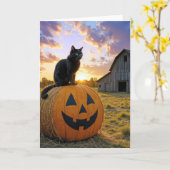 ハロウィンのかぼちゃの干し草の上で黒猫 カード (黄色い花)