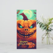 ハロウィンのろうそくに囲まれた怖い顔のカボチャ (スタンド正面)