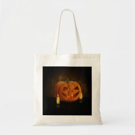 ハロウィンのろうそくをともしたカボチャのランタン トートバッグ