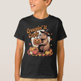 ハロウィンのカピバラ: 魔法使いの帽子をかぶって Creepin’ It Capy Tシャツ