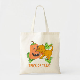ハロウィンのカボチャおよび子犬のトリック・オア・トリート トートバッグ