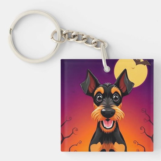 ハロウィンのシーンにいるかわいい犬 キーホルダー (正面)