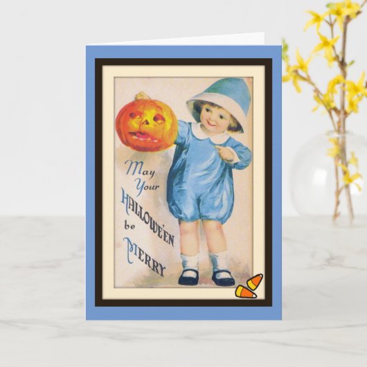 ハロウィンのジャックオーランタンカードを持つ子供 カード (黄色い花)