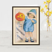 ハロウィンのジャックオーランタンカードを持つ子供 カード (黄色い花)