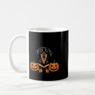 ハロウィンのブラックタン ダックスフント 犬と コーヒーマグカップ