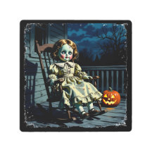 ハロウィンの人形とカボチャ