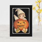 ハロウィンの大きいカボチャを持つヴィンテージの小さな女の子 カード (黄色い花)