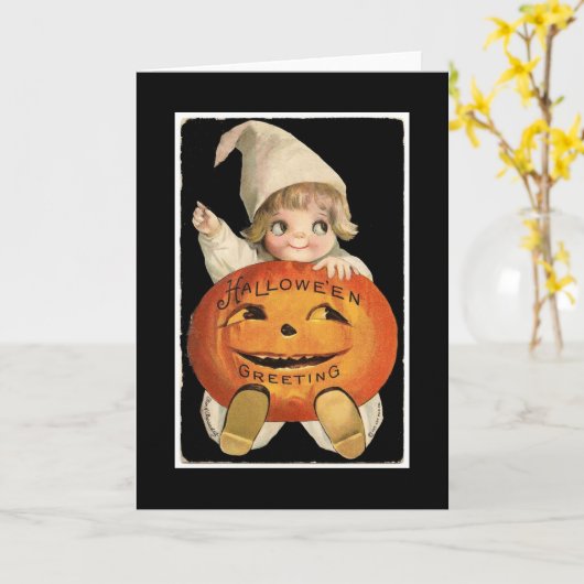 ハロウィンの大きいカボチャを持つヴィンテージの小さな女の子 カード (黄色い花)