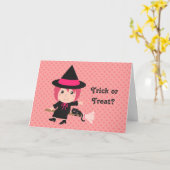ハロウィンの幸せな女の子の魔法使いが付いているトリック・オア・トリート カード (黄色い花)