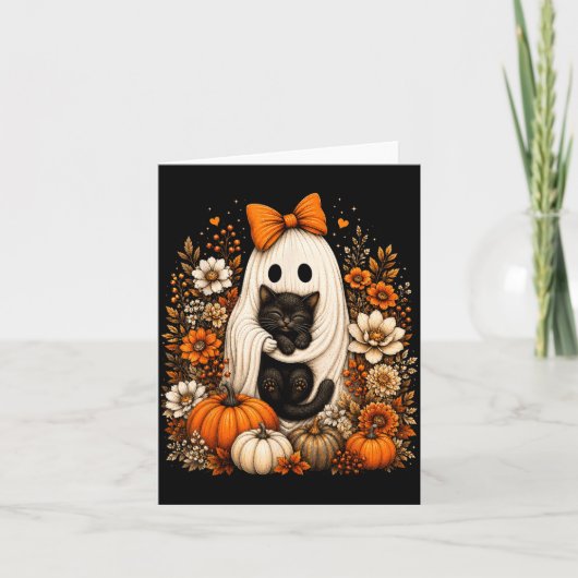 ハロウィンの幽霊が黒猫のかぼちゃの花を持つ カード (正面)