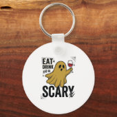 ハロウィンの幽霊は食べ飲みして怖がらせる ビンテージ風_1 キーホルダー (正面)