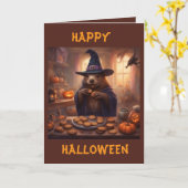 ハロウィンの挨拶をする魔女の格好をしたビーバー カード (黄色い花)