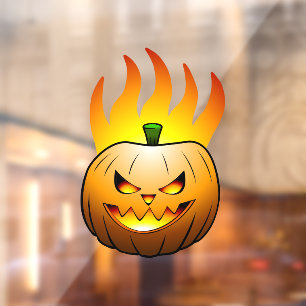 ハロウィンの燃えるカボチャの顔 ウィンドウサイン