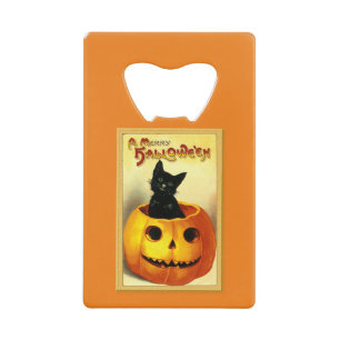 ハロウィンの猫がジャック・オ・ランタンに座っている クレジットカード栓抜き
