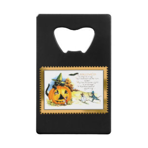 ハロウィンの猫がジャック・オ・ランタンに座っている クレジットカード栓抜き