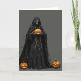 ハロウィンの骸骨が黒いフード付きマントを着用してカット シーズンカード