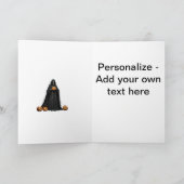 ハロウィンの骸骨が黒いフード付きマントを着用し、カット シーズンカード (内部)