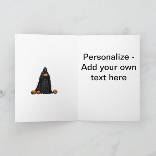 ハロウィンの骸骨が黒いフード付きマントを着用し、カット  シーズンカード (内部)