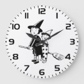 ハロウィンの魔女とピエロの箒乗り ラージ壁時計 (正面)