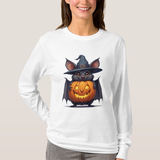 ハロウィンの魔女のコウモリがジャック・オ・ランタンを抱える🦇 Tシャツ (正面)