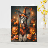 ハロウィンの魔女の犬 かわいい秋 カード (黄色い花)