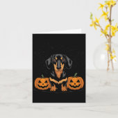 ハロウィンの黒とタンのダックスフント犬 カード (黄色い花)