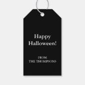 ハロウィンの黒背景に骨だけのスケルトンの手 ギフトタグ (裏面)