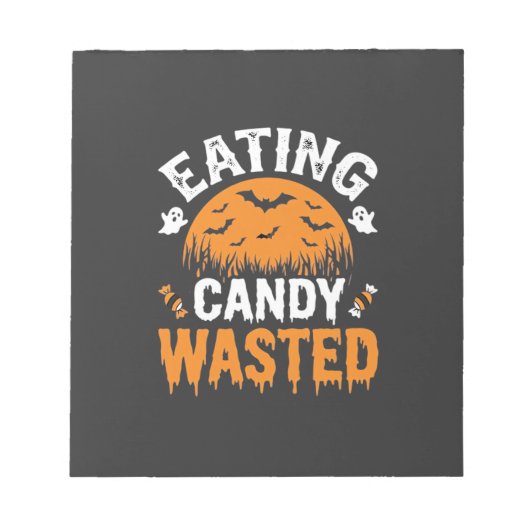 ハロウィンデザイン お菓子を食べ過ぎ_1 ノートパッド (正面)