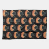 ハロウィンパターンのカボチャの中の可愛い黒猫 キッチンタオル (横)
