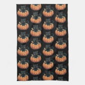 ハロウィンパターンのカボチャの中の可愛い黒猫 キッチンタオル (縦)