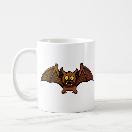 ハロウィン かわいい茶色いコウモリ 黄色い目と牙 コーヒーマグカップ (左)