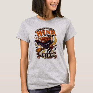 ハロウィン 飛ぶ魔女 風が髪をなびかせる Tシャツ