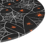 ハロウィーンくもの巣とクモの背景。 カッティングボード (角)