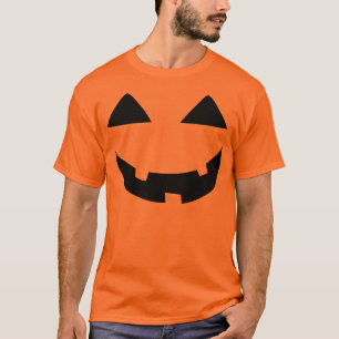 ハロウィーンのカボチャのちょうちんは直面します Tシャツ