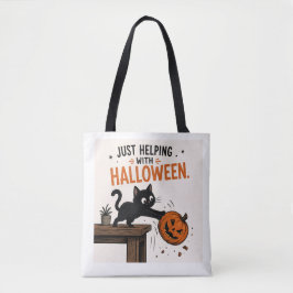 ハロウィーンのカボチャをひっくり返す黒猫の面白いイラスト トートバッグ