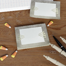 ハロウィーンのスケルトン手のノートをポスト ポストイット