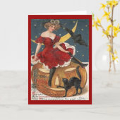 ハロウィーンのヴィンテージレディ・イン・レッド・オン・ジャック・ランタン カード (黄色い花)