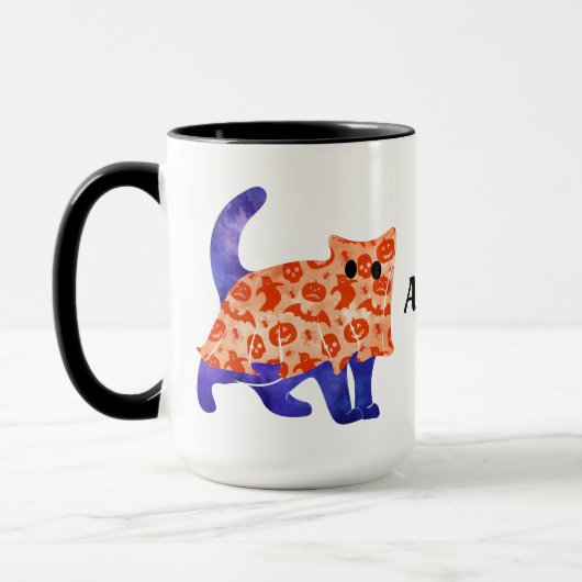 ハロウィーンの衣装を着た可愛い青い猫2マグカップ マグカップ (左)
