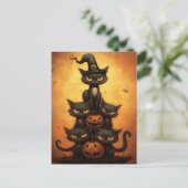 ハロウィーンの黒猫がカボチャに座っている。 ポストカード (スタンド正面)