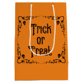 ハロウィーンカボチャのオレンジとブラックトリックまたはトリート ミディアムペーパーバッグ (裏面)