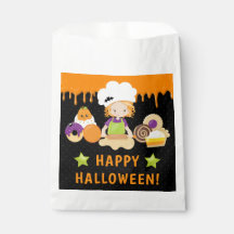 ハロウィーンケーキとベーキング赤毛ガール