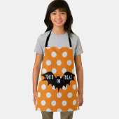 ハロウィーントリックまたはオレンジの水玉模様を扱う エプロン (インサイチュ)