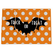 ハロウィーントリックまたはオレンジの水玉模様を扱う ラージペーパーバッグ (正面)