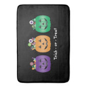 ハロウィーンハロウィーンのカボチャのちょうちんキャンディペールのトリックまたは治療 バスマット (正面縦)