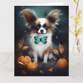 ハロウィーンパピヨンとカボチャ怖い カード (黄色い花)