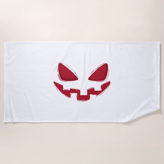 ハロウィーンパンプキン顔 ビーチタオル (正面)