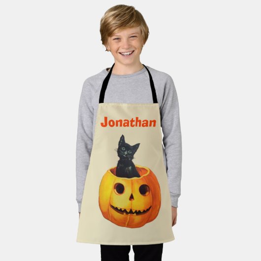 ハロウィーンブラックキャットカボチャカスタムの子供 エプロン (着用した状態)