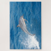 ハワイでのイルカのジャンプのアクションショット ジグソーパズル (縦)
