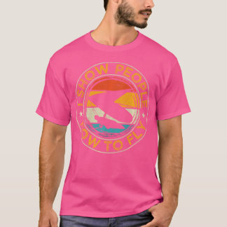 ハンググライダーのデザインを飛ばす方法を示す Tシャツ