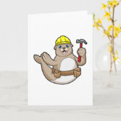 ハンマーと帽子をつけたカーペンターのトド カード (黄色い花)